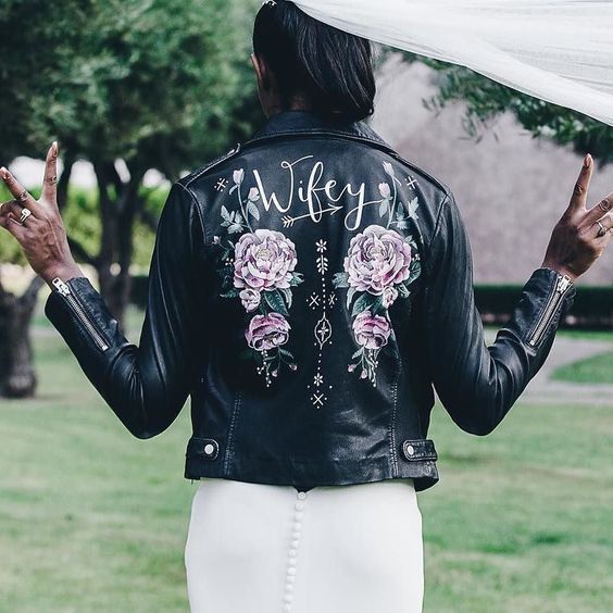 a hand painted leather jacket in black is a gorgeous feminine statement
