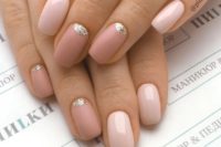 11 glossy and matte nude and dusty pink nails with silve glitter half moons for a super trendy look