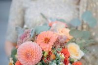 12 a peach and coral wedding bouquet with dahlias, roses and muted greenery