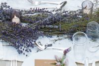 13 a chic lavender table runner with candles incorporated – you won’t need any floral centerpieces