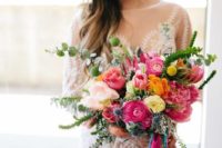 16 a summer wedding bouquet with pink, orange and blush flowers, greenery and colorful hanging ribbons