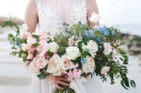 17 a large textural coastal bouquet with white, blush and blue blooms