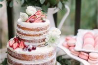 18 a pretty naked cake with fresh blooms, strawberries and cherries feels like summer
