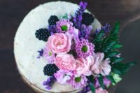 22 a vanilla lavender naked cake with pink and purple blooms and blackberries