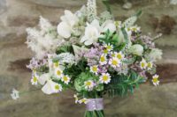 24 a pretty creamy wedding bouquet with touches of mauve and pink is a sweet idea for a rustic wedding