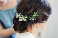 a wavy wedding updo with a volume on top and some locks down plus fresh blooms is ideal for medium hair