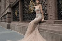 02 a breathtaking strapless mermaid wedding dress with rhinestones and appliques and a long train for a wow effect