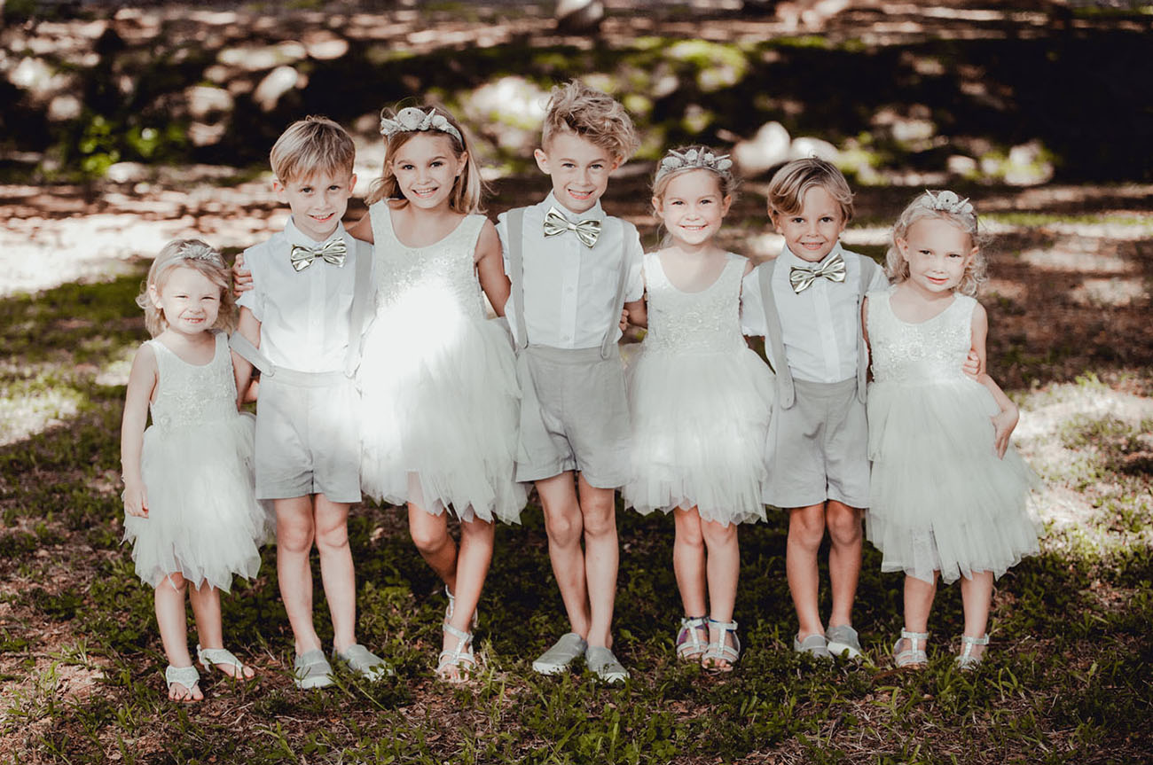 The kids were wearing dove grey and white, all the attire was sewn by the bride