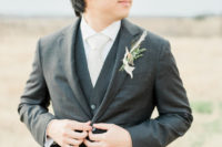 05 The groom was rocking a dark greey three-piece wedding suit, a white shirt and tie