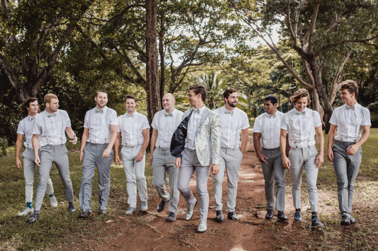 The groomsmen were rocking grey pants, bow ties and short-sleeved shirts