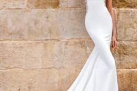 05 a modern sheath wedding dress with a bateau neckline, embellished sides and a train