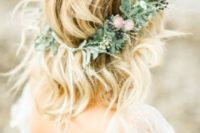 a textural greenery crown with pink wildflowers and berries for a summer boho bride