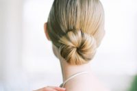06 a minimalist sleek ballet bun is a chic statement for a minimal bride to rock on a big day