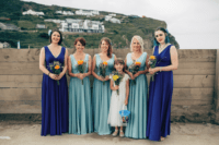 07 The bridesmaids were wearing aqua and bold blue thick strap dresses with V-necklines