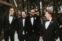 07 The groomsmen were wearing black tuxedos