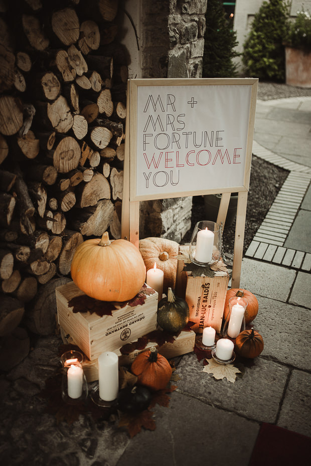 The whole wedding decor was done fully fall-inspired, with pumpkins and candles