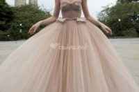 09 a gorgeous taupe princess-style ballgown with a corset-styled bodice and a layered full skirt
