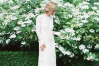 10 a lace sheath wedding dress with long sleeves, a high neckline, a small train and buttons for a modest look