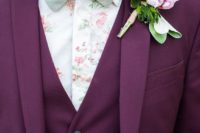 10 a whimsy groom’s outfit with a burgundy three-piece suit, a floral print shirt, a matching green bow tie