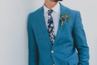 11 a blue suit, a white shirt, a navy floral print tie for a summer or coastal groom