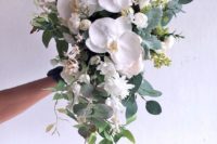 11 a chic textural cascading wedding bouquet with white orchids and various greenery for a chic look