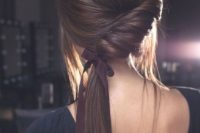 12 a chic twisted side low ponytail with bangs and a ribbon for an accent is ideal for a modern wedding