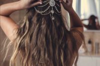 12 long waves down accented with a jeweled chain that looks boho and a bit gypsy-like
