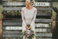 a boho lace wedding dress with long sleeves and a high neckline by Grace Loves Grace
