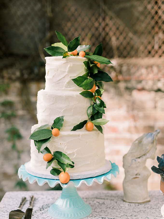 The wedding cake was a simple white one with kumquats