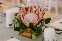 king protea table decor for a wedding