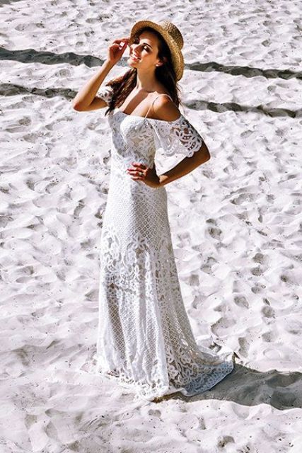 a boho lace off the shoulder sheath wedding dress with spaghetti straps for a boho beach look