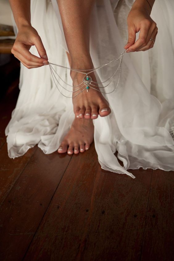 gypsy anklets with layeres of silver chain and some turquoise stones for a boho bride