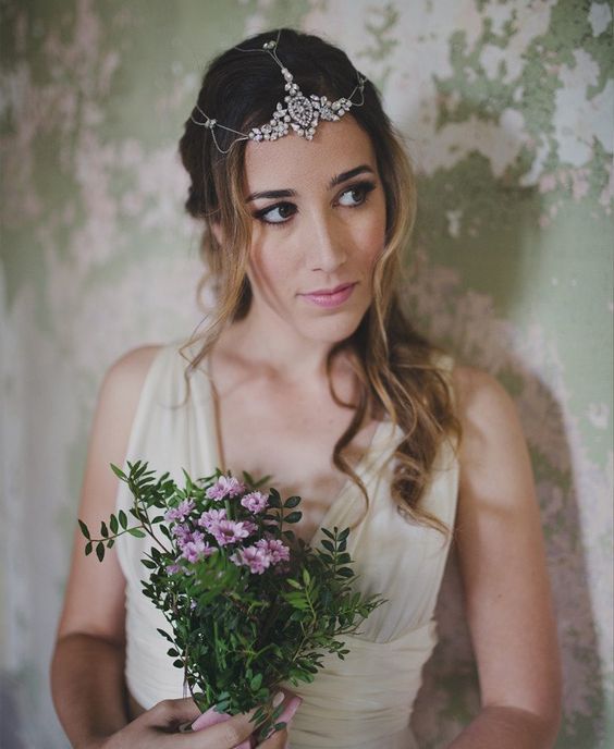 a gorgeous chain and rhinestone headpiece for a sparkly boho bridal look