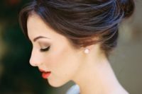 17 a modern and chic wedidng updo with a textural bump on top looks very sexy and cool