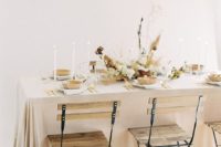 20 a soft-colored taupe tablecloth, touches of natural wood and grasses for a naturally beautiful look