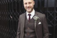 23 a dark brown three-piece tweed suit, a plum-colored tie, a baby’s breath boutonniere for vintage style