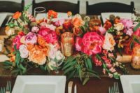 23 a very colorful and vibrant blooming table runner in pink, orange, blush and yellow with some greenery touches