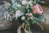 24 a cute wedding bouquet with eucalyptus, blush garden roses and thistles plus blush ribbons