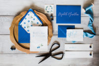 01 The wedding stationery was done with bold blue envelopes, with painted blueberry and blue calligraphy