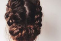 02 a cool braided low updo with a texture looks cool for a rustic or boho bride