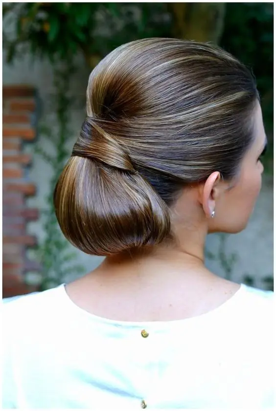 a low chignon hairstyle with a tight top and a twist is ideal if you have thick hair