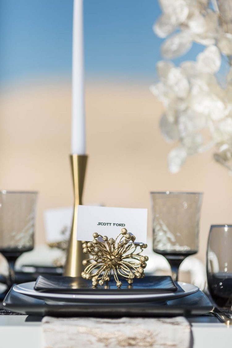 The table featured black plates, glasses and lots of gold touches for a chic feel