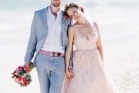 04 a grey suit, a pink belt to match the wedding dress for a serene look