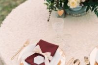 05 a glam table setting with touches of blush and burgundy plus a sequin tablecloth