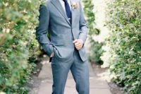 05 a modern grey suit, a navy tie, dark brown shoes for an effortlessly chic look