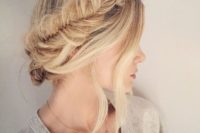 08 a fishtail braid halo updo with locks down is ideal for a boho bride and looks unique