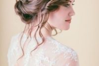 10 a loose updo with a braided element and locks down for a rustic or boho wedding