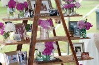 10 a wedding display with photos, flowers and frames can be a nice wedidng decoration for any space