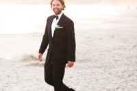 11 a classic black tux is always a way to go, even on the beach