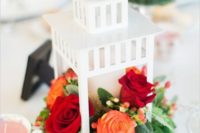12 Borrby lantern by IKEA is turned into a chic and romantic wedding centerpiece with blooms